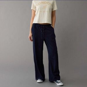 American Eagle wide-leg pants with navy blue stripes, US size M.